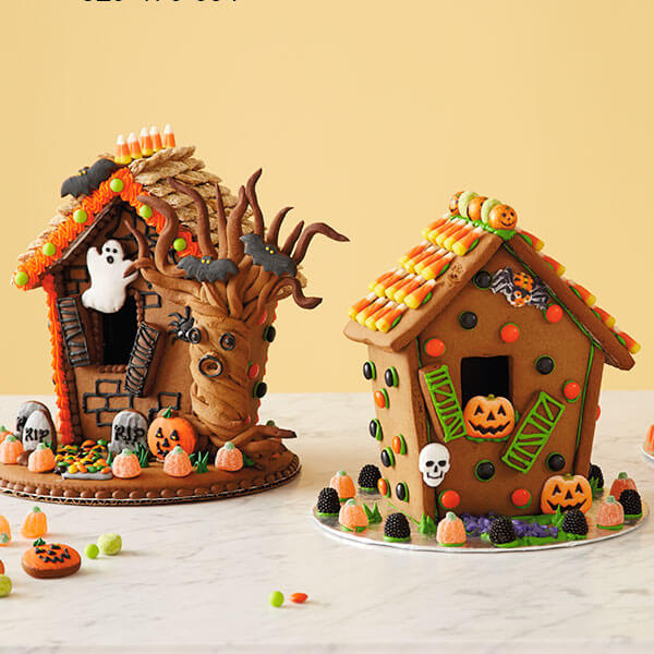 Halloween gingerbread houses decorated with candy.